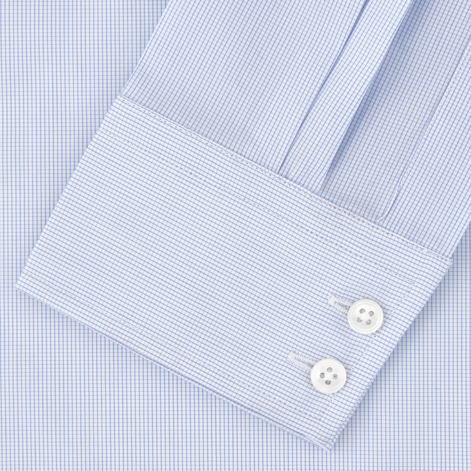 View 4 of product A Tailored Fit Blue Fine Bengal Stripe Shirt with a Kent Collar and 2-button cuffs by Turnbull & Asser, neatly folded and displayed against a plain white background.