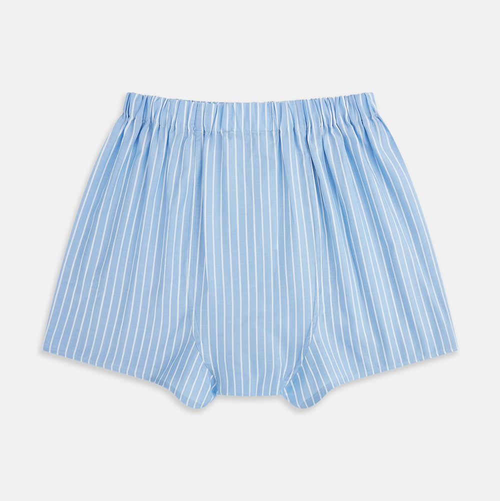 Turnbull & Asser White and Blue Stripe Godfrey Boxer Shorts, crafted from premium Italian cotton with vertical white pinstripes, an elastic waistband, and a loose fit, are shown laid flat on a white background.