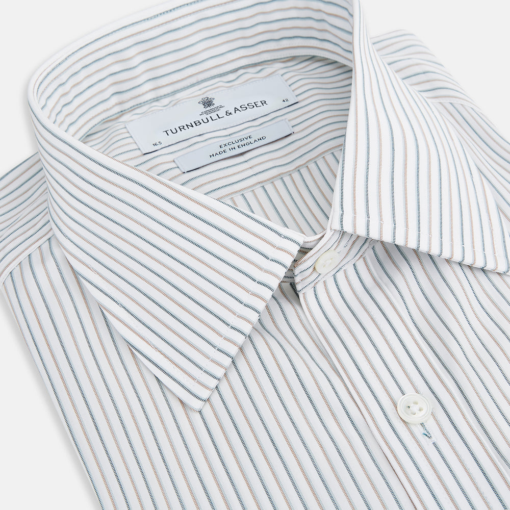 The Teal Double Stripe Mayfair Shirt by Turnbull & Asser is a long-sleeved, button-up shirt with thin teal stripes, a pointed collar, and buttoned cuffs—an essential piece for any gentleman’s wardrobe, shown laid flat on a white background.