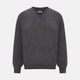 The Charcoal Grey Cashmere V-neck Jumper by Turnbull & Asser features ribbed cuffs, hem, and neckline—an essential knitwear piece, shown on a white background.