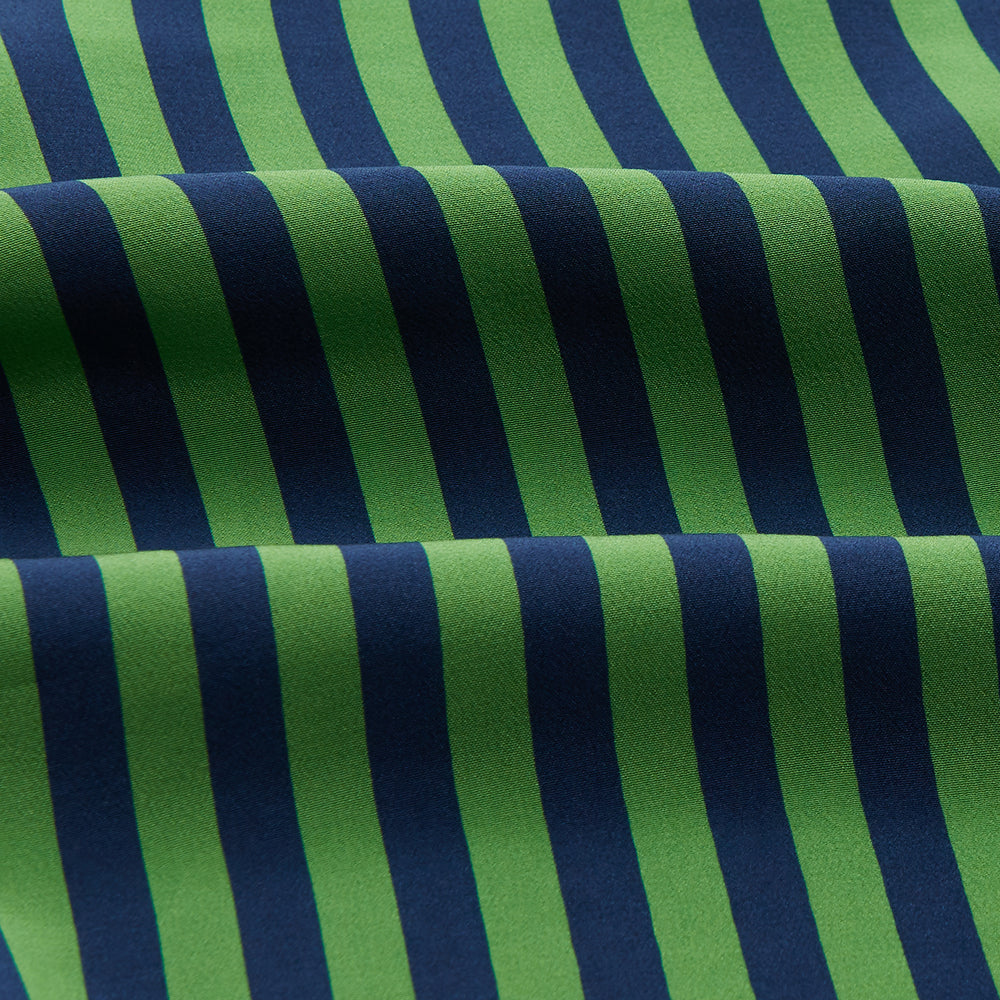 The Turnbull & Asser Green and Navy Candy Stripe Silk Weekend Fit Harold Shirt features long sleeves, a button-up front, collar, and cuffs, displayed laid flat on a white background.