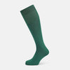 View 1 of product Turnbull & Asser's Forest Green/Navy Polka Dot Long Sock, made from mercerised Egyptian cotton, features a subtle dotted pattern and is shown against a plain white background.
