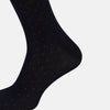 View 4 of product The Turnbull & Asser Navy/Azzurro Polka Dot Mid-Length Sock features subtle light blue polka dots on navy cotton, shown against a plain white background.