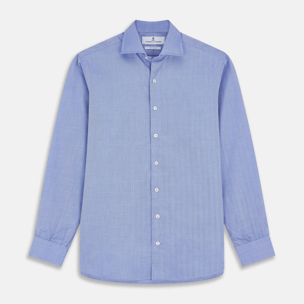 Turnbull & Asser's Blue Herringbone Tailored Fit Shirt with a Kent collar and white buttons is shown laid flat on a white background.