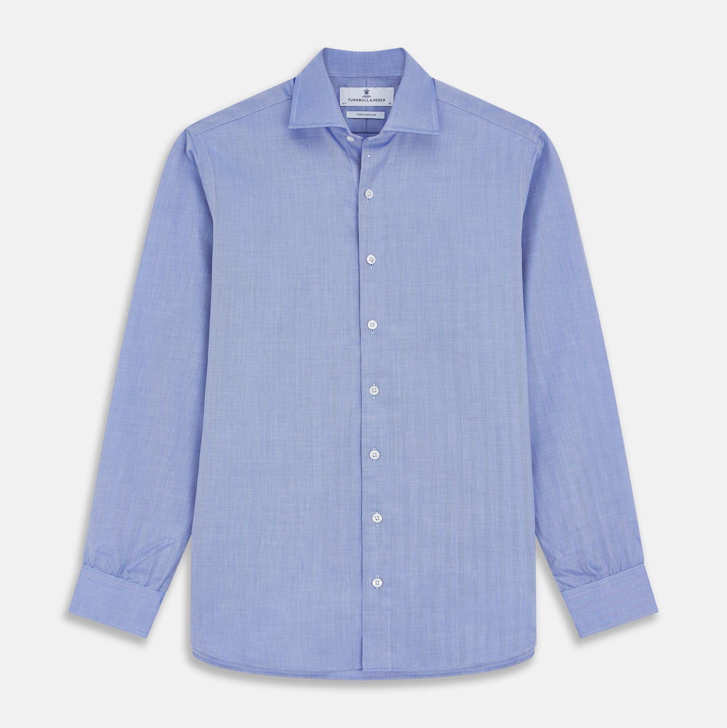 View 1 of product Turnbull & Asser's Blue Herringbone Tailored Fit Shirt with a Kent collar and white buttons is shown laid flat on a white background.