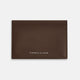 The Dark Brown Leather Bi-Fold Card Holder by Turnbull & Asser features neat edge stitching and the brand's name embossed in white on the front.