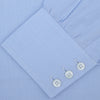 View 2 of product The Turnbull & Asser Light Blue Herringbone Superfine Cotton Shirt features a T&A collar and 3-button cuffs, elegantly displayed against a plain white background.
