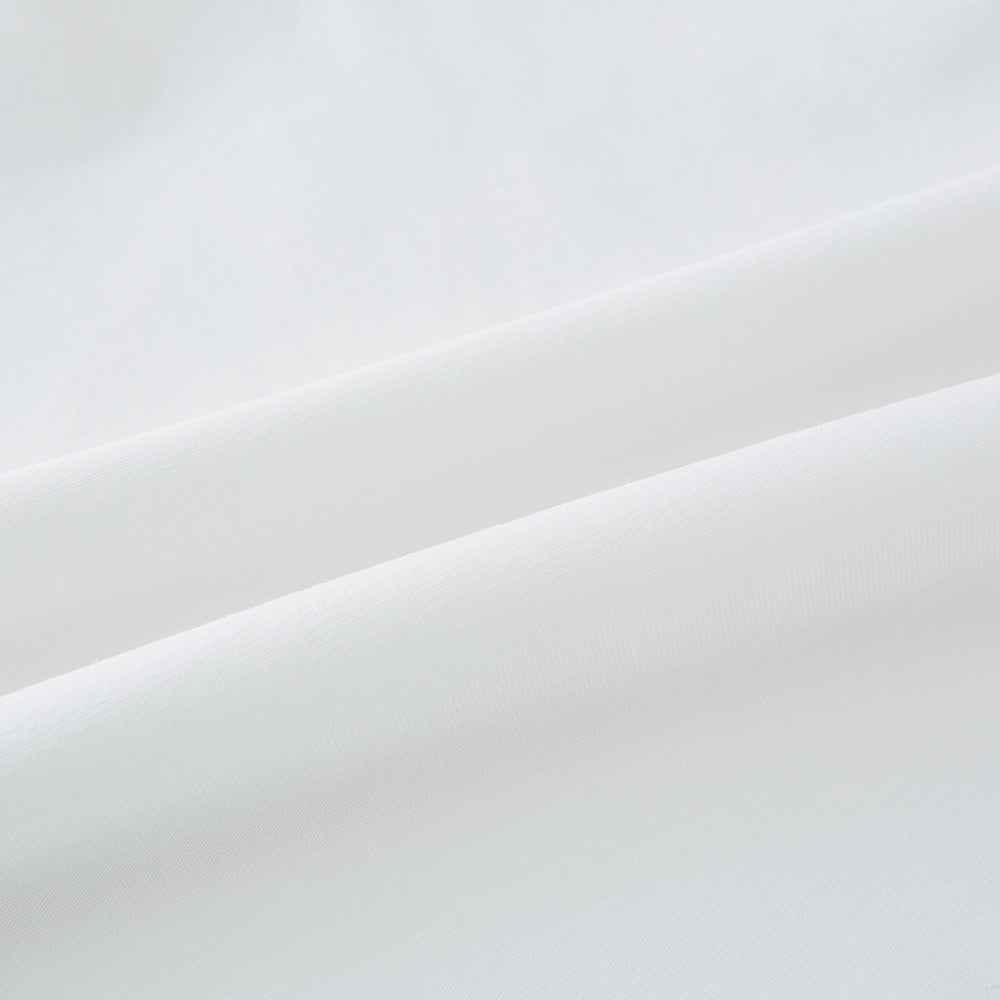 Experience comfort in the Turnbull & Asser White Short-sleeve Pyjama Shirt—a plain crew neck T-shirt laid flat on a white background, perfect as elevated loungewear or a sleek pyjama essential.