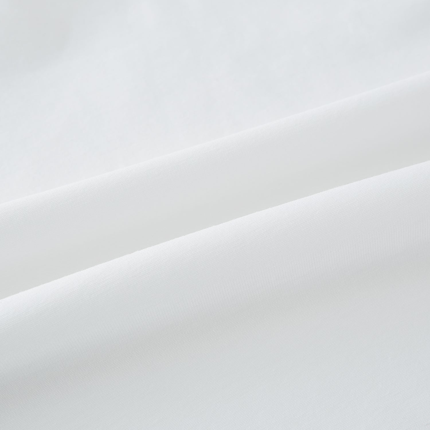 View 6 of product Experience comfort in the Turnbull & Asser White Short-sleeve Pyjama Shirt—a plain crew neck T-shirt laid flat on a white background, perfect as elevated loungewear or a sleek pyjama essential.