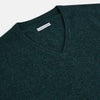View 2 of product The Turnbull & Asser Forest Green Cashmere V-Neck Jumper features long sleeves, ribbed cuffs, collar, and hem. Shown against a white background, it's a classic knitwear piece ideal for layering.