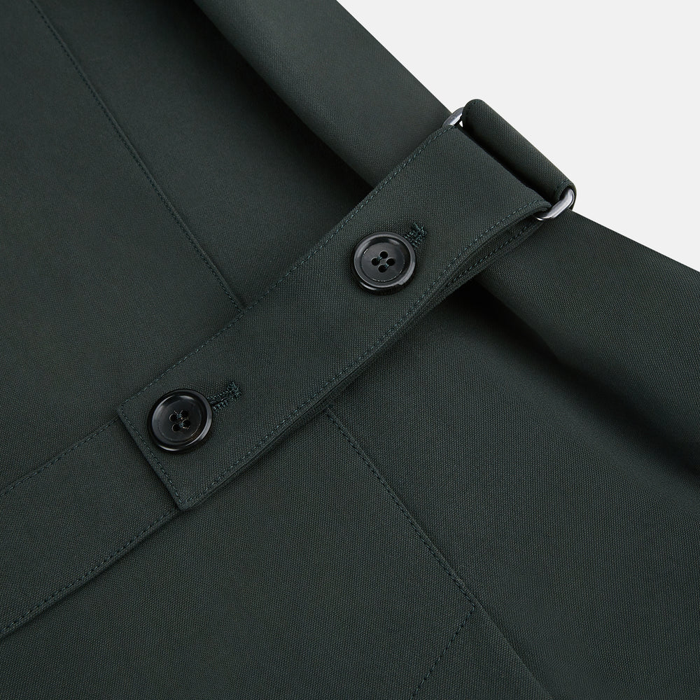 A Forest Green John Arthur Trench Coat by Turnbull & Asser, knee-length with a single-breasted button closure, three zippered pockets, and buttoned cuffs, is laid flat on a white background.