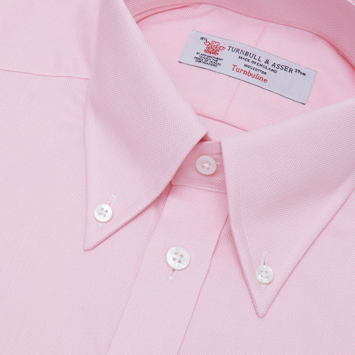View 2 of product The Turnbull & Asser Pink Royal Oxford Cotton Shirt features a button-down collar and 3-button cuffs, ideal for men's weekend wear. Displayed against a plain white background.
