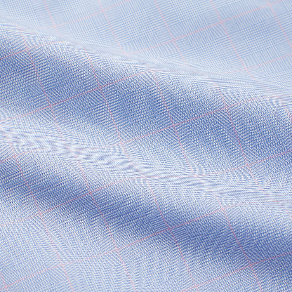 A Blue and Red Prince of Wales Check Mayfair Shirt by Turnbull & Asser, featuring long sleeves, a spread collar, buttoned cuffs, and button-up front, is laid flat on a white background.