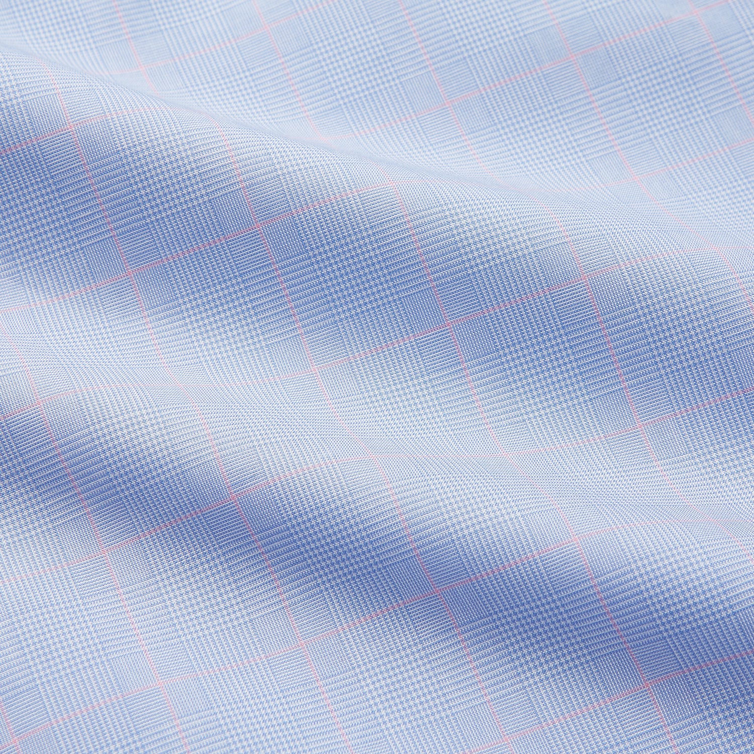 View 5 of product A Blue and Red Prince of Wales Check Mayfair Shirt by Turnbull & Asser, featuring long sleeves, a spread collar, buttoned cuffs, and button-up front, is laid flat on a white background.