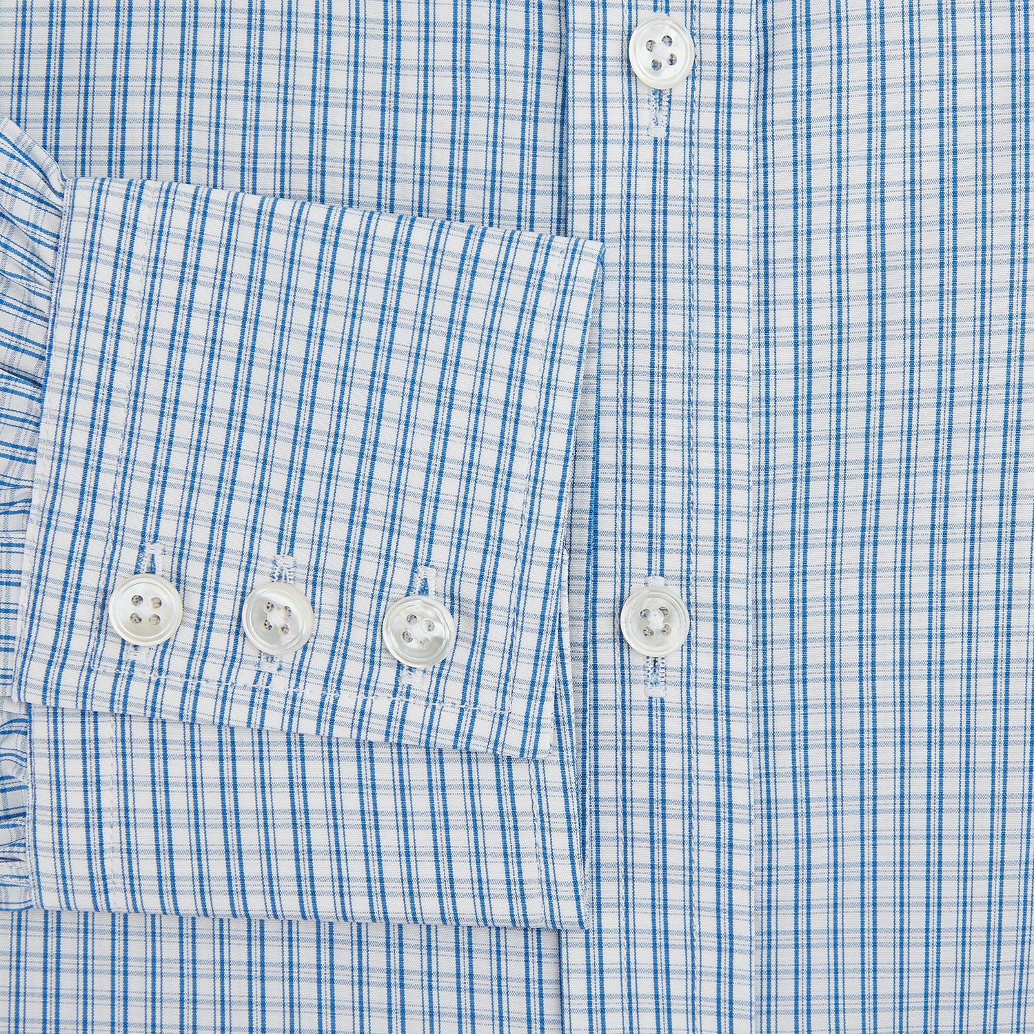 View 4 of product The Sky Blue Micro Graph Check Mayfair Shirt by Turnbull & Asser features a classic T&A collar, button-down front, and buttoned cuffs, shown laid flat on a white background.