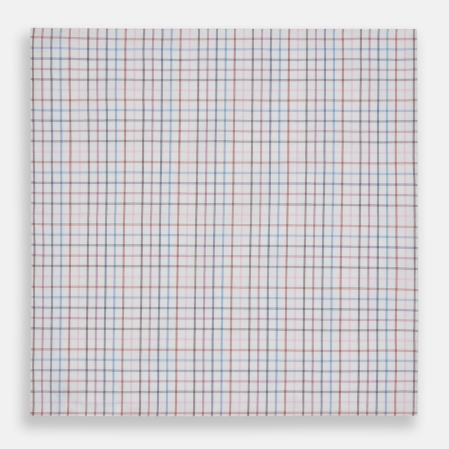 View 3 of product The Turnbull & Asser Hand Rolled Multi Graph Check Handkerchief features a white cotton base with thin red, blue, and purple intersecting lines forming a check pattern, neatly folded with stitched edges for an elegant gentleman's accessory.