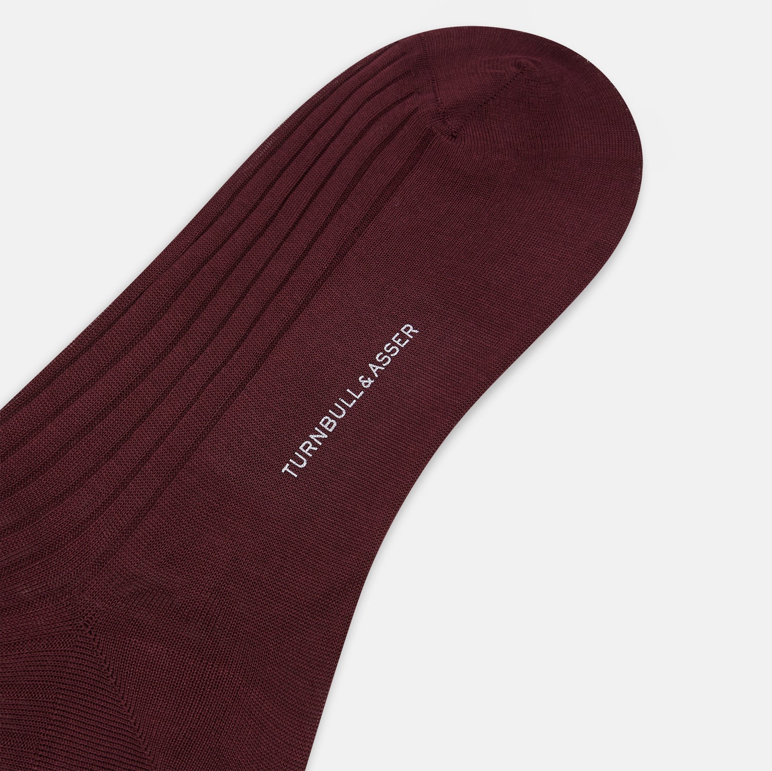 View 3 of product Turnbull & Asser Burgundy Mid-Length Socks are shown against a white background, crafted from luxurious mercerised Egyptian cotton for ultimate comfort and style.