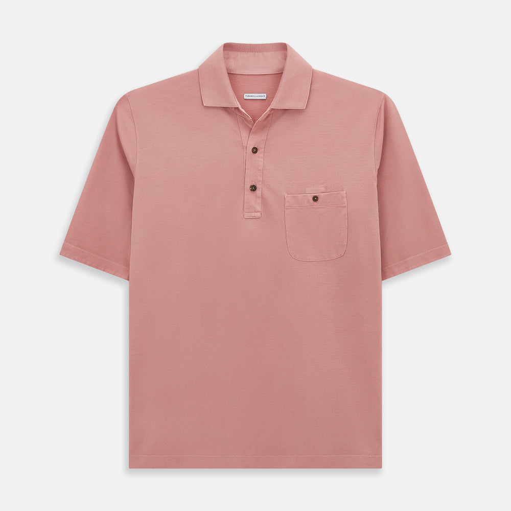 The Turnbull & Asser Red Polo Shirt is a men's cotton polo with short sleeves, a collar, a three-button neckline, and a buttoned chest pocket. The shirt is shown laid flat on a white background.