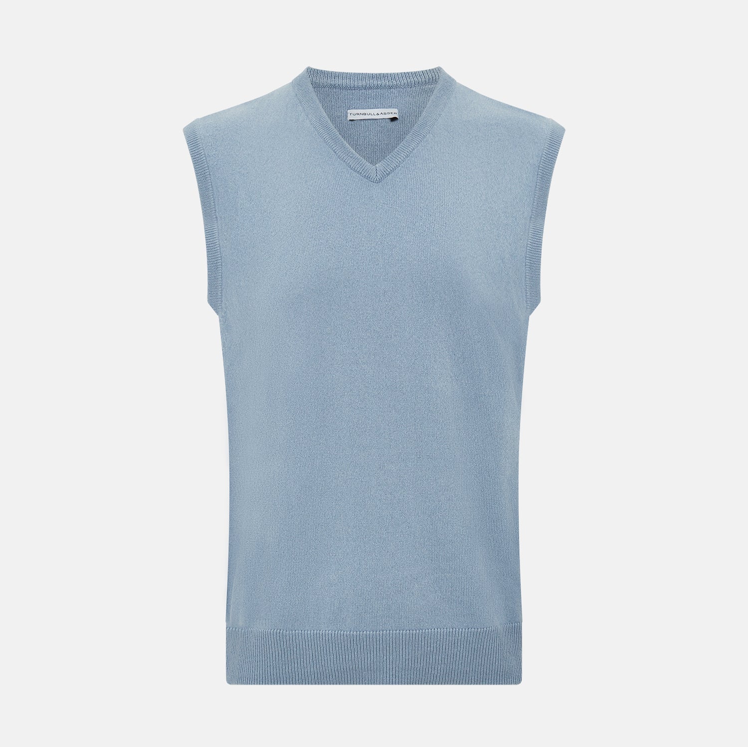 View 1 of product The Frost Blue Cashmere V-neck Vest by Turnbull & Asser features a sleeveless knit design and ribbed edges, shown on a white background—a sophisticated addition to gentleman’s fashion.