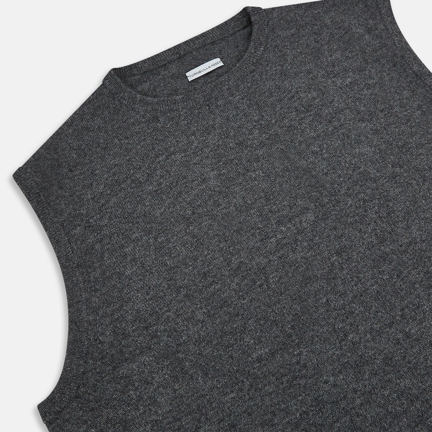 View 2 of product The Turnbull & Asser Charcoal Grey Cashmere Round Neck Vest is a sleeveless knit sweater vest shown against a plain white background.