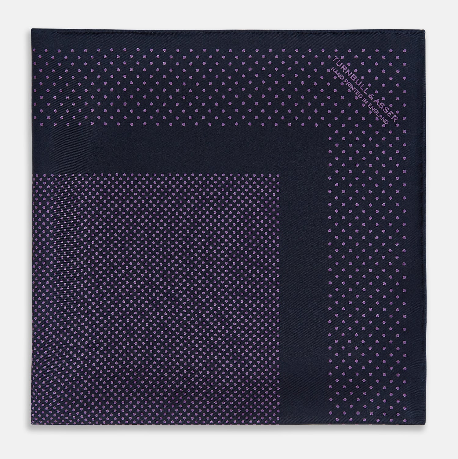 View 3 of product The Turnbull & Asser Navy and Purple Dot Silk Pocket Square features a stylish dot pattern—ideal for adding a refined touch to your look.