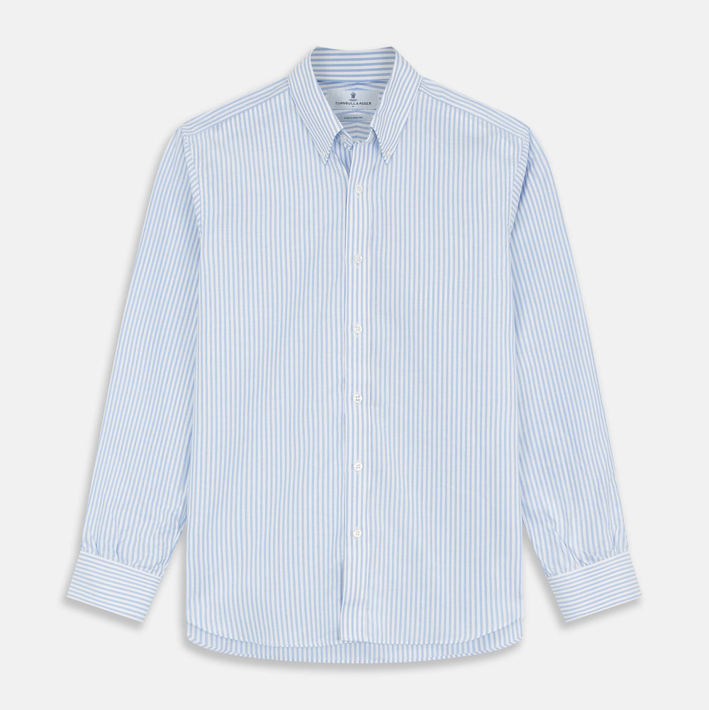 The Turnbull & Asser Pale Blue Stripe Weekend Fit Hayne Shirt features a Dorset collar, 1-button cuffs, and vertical stripes, shown laid flat against a white background.