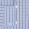 View 4 of product Turnbull & Asser's Blue and Navy Multi Check Piccadilly Shirt features long sleeves, a pointed collar, and two buttoned chest pockets, shown on a white background.