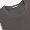 View 2 of product The Turnbull & Asser Shadow Grey Short-Sleeve T-shirt, featuring a classic crew neck and minimalist design with no visible logos, is laid flat on a white background—an ideal versatile staple for everyday wear.