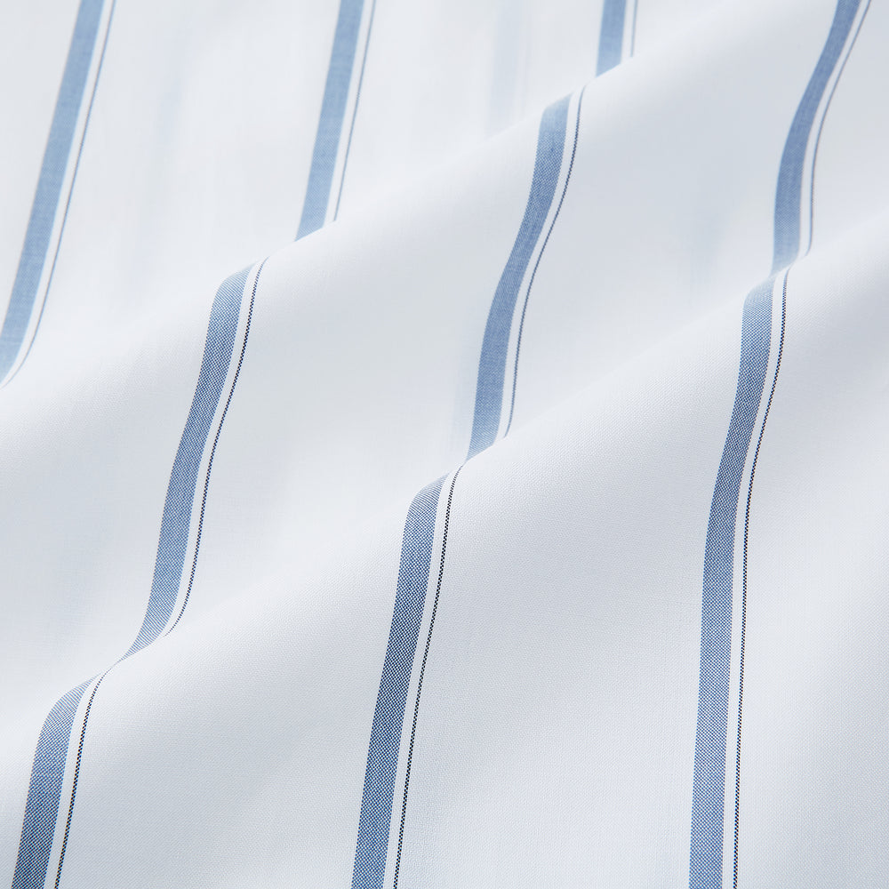 The Turnbull & Asser Steel Grey Track Stripe Mayfair Shirt is a long-sleeve Italian cotton shirt with vertical stripes, a button-down front, and classic collar, shown laid flat on a white background.