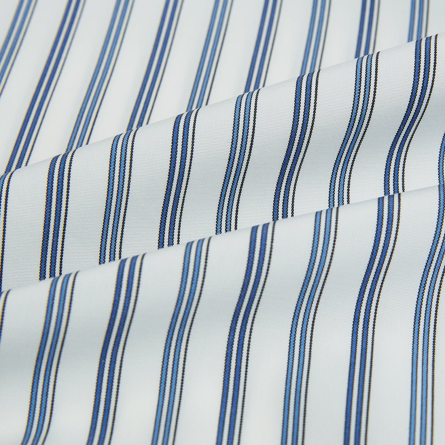 View 8 of product The Sapphire Blue Multi Track Stripe Westminster Shirt by Turnbull & Asser features a turnbull collar and vertical stripes, elegantly displayed flat against a white background—an ideal example of British craftsmanship.