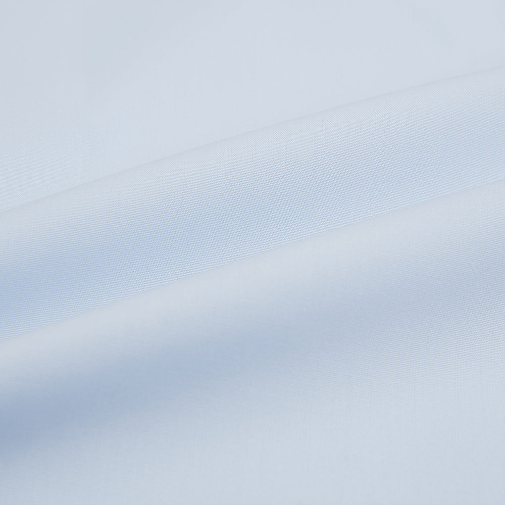 The Light Blue Mayfair Shirt by Turnbull & Asser is a men's cotton dress shirt featuring a pointed collar and button-down front, shown flat on a white background.