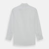 View 5 of product The Turnbull & Asser Tailored Fit Plain White Cotton Shirt features a Kent collar, button-down front, long sleeves, and double cuffs, shown on a white background.