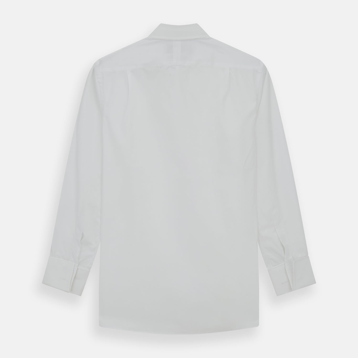View 5 of product The Turnbull & Asser Tailored Fit Plain White Cotton Shirt features a Kent collar, button-down front, long sleeves, and double cuffs, shown on a white background.