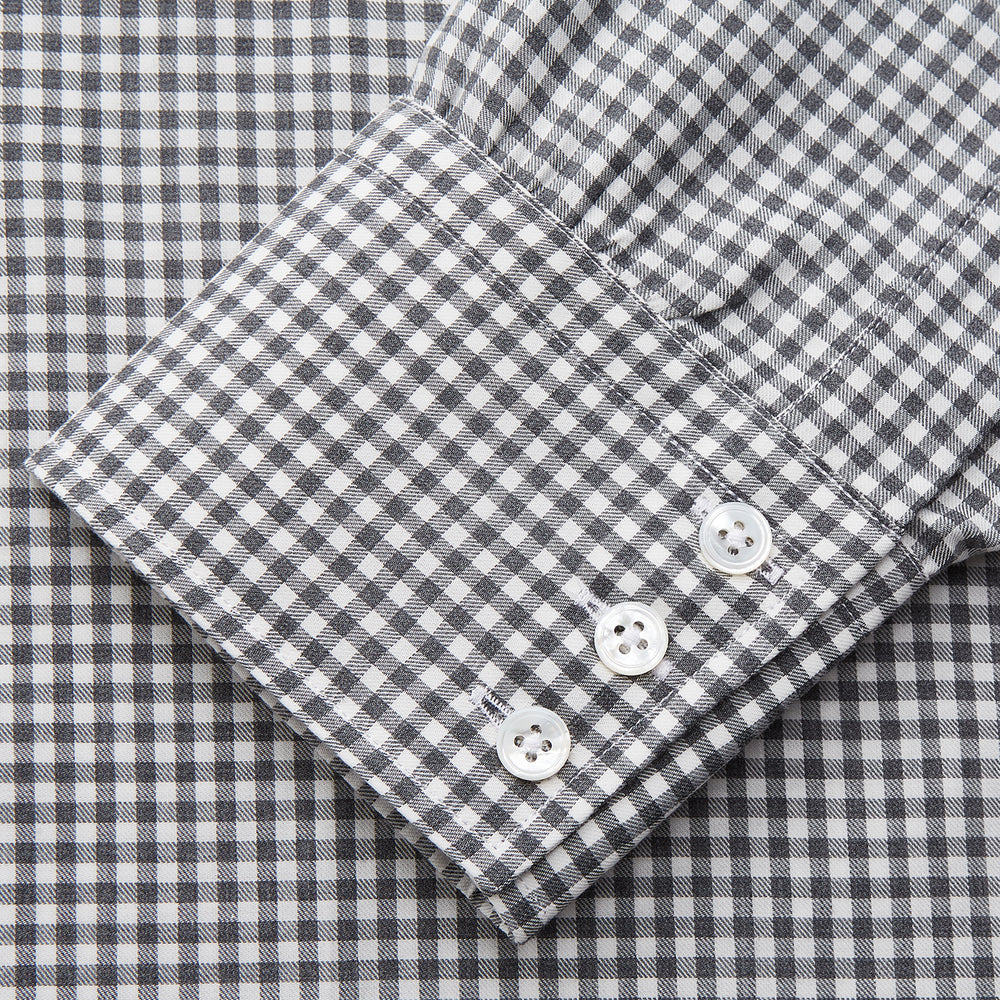 The Turnbull & Asser Grey Gingham Check Cotton Melange Regular Fit Mayfair Shirt, shown flat against a white background, offers a classic designer look with its small black and white check pattern and button-down design.