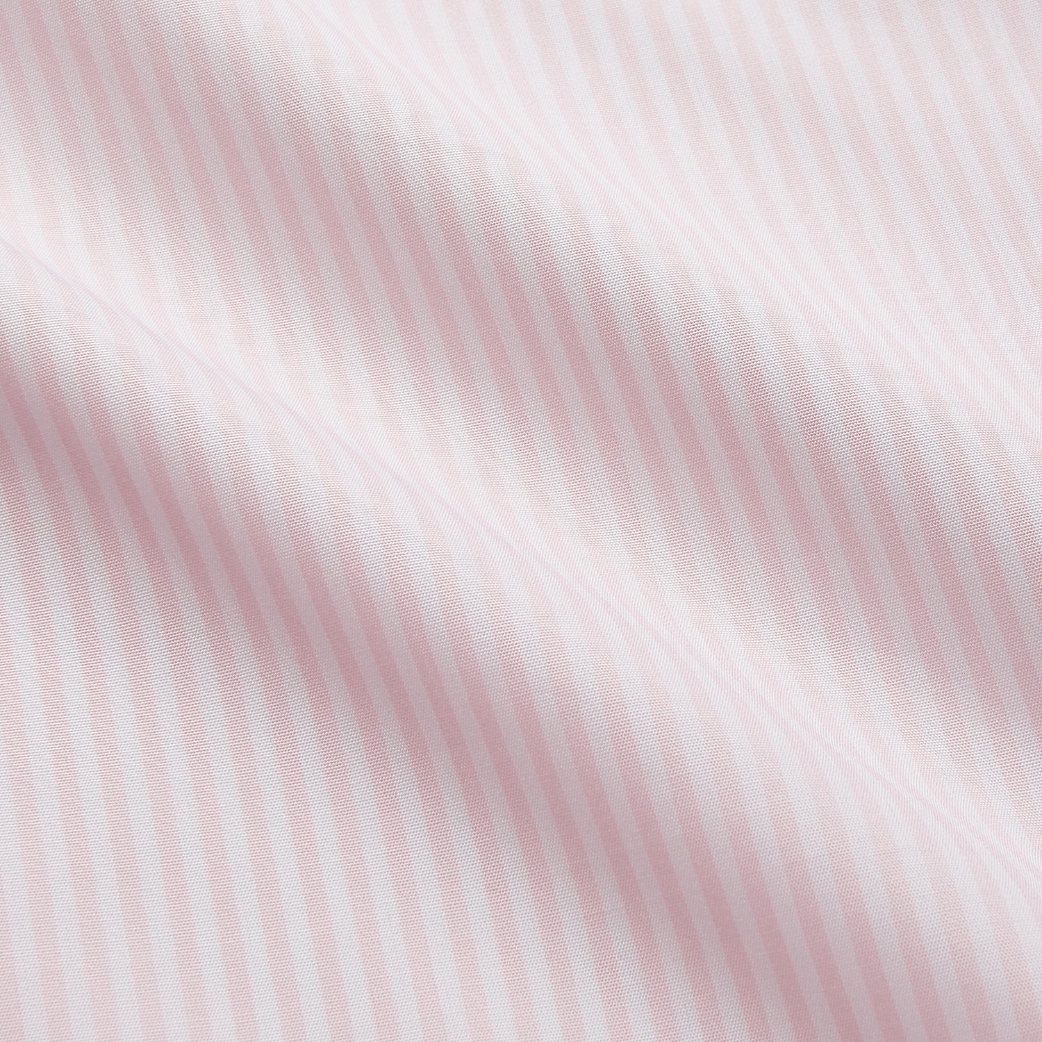 View 4 of product The Turnbull & Asser White and Pink Wide Stripe Shirt with Double Cuffs features a minimalist design, with bold vertical stripes and long sleeves, shown laid flat against a white background.