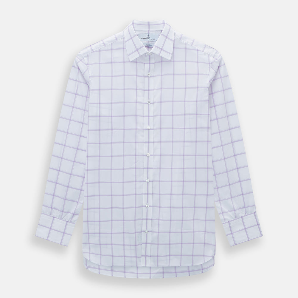The Turnbull & Asser Lilac Grid Check Mayfair Shirt is a long-sleeve, button-up style crafted from Italian cotton with a white base and lilac grid check pattern, shown on a plain white background.