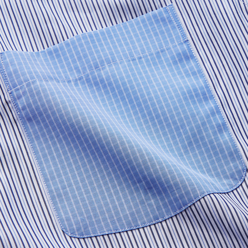 The Turnbull & Asser Blue Multi Stripe Cotton RE-PURPOSE Weekend Fit Finch Shirt features thin blue and white stripes, a contrasting light blue checkered chest pocket, and is crafted sustainably using recycled fabrics.