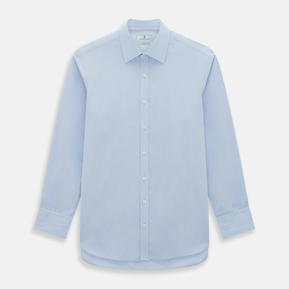 The Pale Blue Mayfair Shirt by Turnbull & Asser is a long-sleeve, button-up dress shirt with a pointed collar and buttoned cuffs, crafted from sanforised cotton and shown laid flat on a white background.