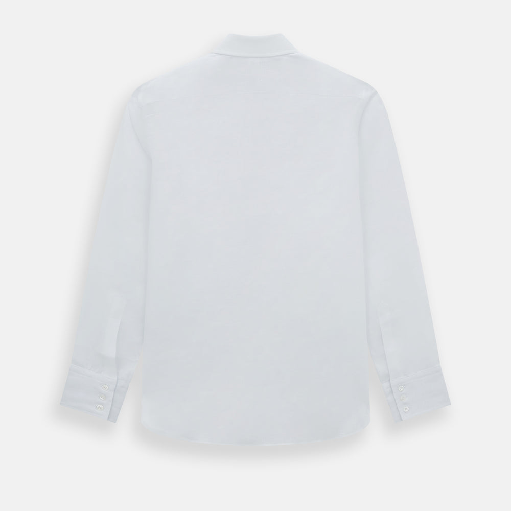 The White Linen Westminster Shirt by Turnbull & Asser features a classic Turnbull collar and button-down front, highlighting British craftsmanship against a plain white background.