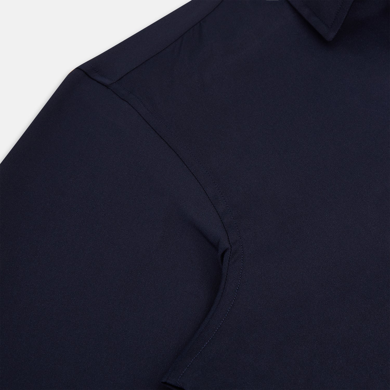 View 6 of product The Navy Twill Windsor Shirt by Turnbull & Asser features long sleeves, a button-up front, British craftsmanship, and a refined Windsor collar, shown in dark navy on a plain white background.