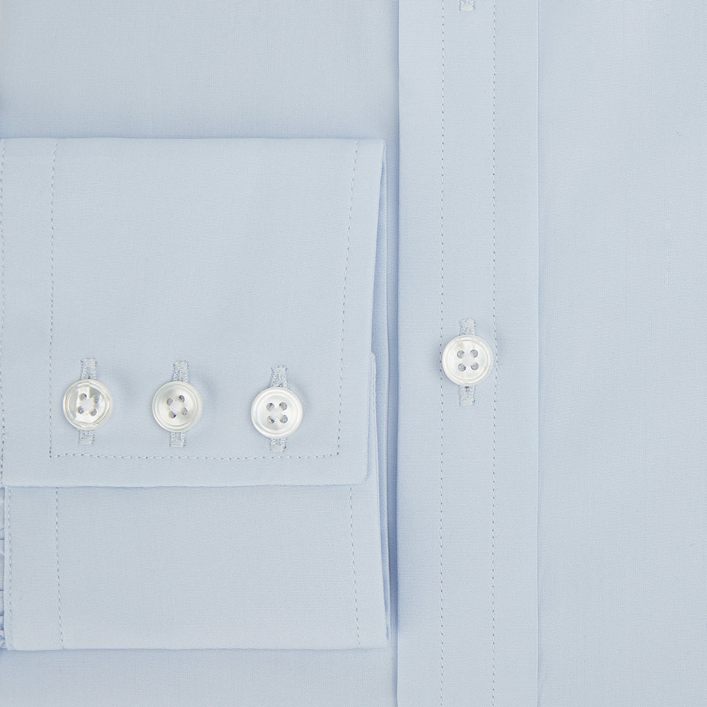 The Turnbull & Asser PALE BLUE COTTON REGULAR FIT MAYFAIR SHIRT is a long-sleeve, button-down shirt with a pointed T&A collar, shown laid flat on a white background.