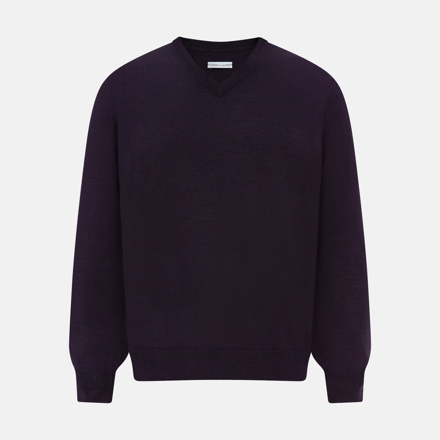 View 1 of product The Turnbull & Asser Dark Purple Fine Merino V-Neck Jumper features long sleeves and a classic knit, shown against a white background.