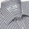View 2 of product The Turnbull & Asser Navy Stripe Weekend Fit Shirt features a Derby collar, vertical navy and white stripes, 1-button cuffs, a chest pocket, and a regular fit, shown laid flat against a white background.