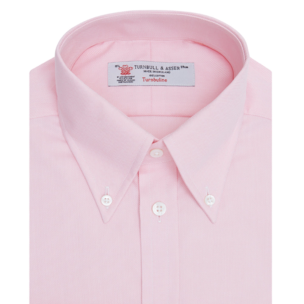 The Turnbull & Asser Pink Royal Oxford Cotton Shirt features a button-down collar and 3-button cuffs, ideal for men's weekend wear. Displayed against a plain white background.