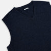 View 2 of product The Turnbull & Asser Navy Melange V-neck Cashmere Vest is a sleeveless jumper with a classic, pattern-free design, showcased against a plain white background for an elegant and timeless look.