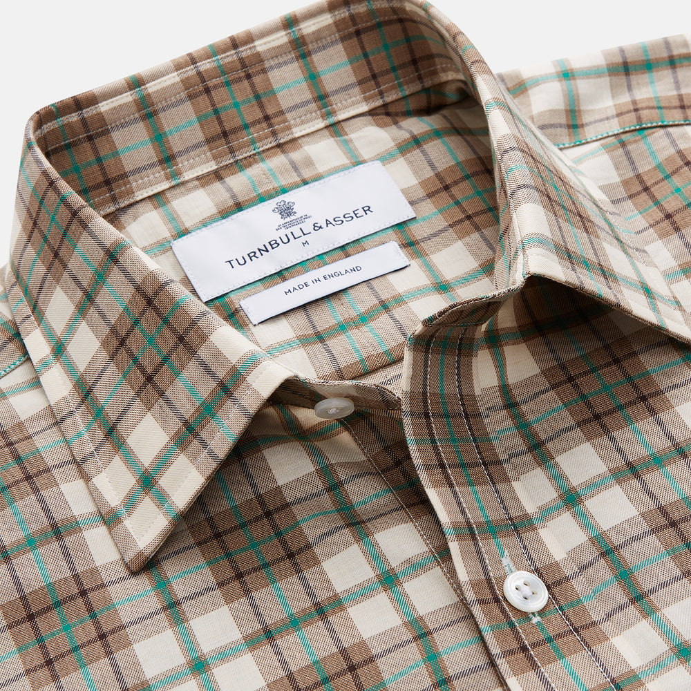The Turnbull & Asser Green and Oatmeal Cotton Weekend Fit Langston Shirt features a Derby collar, long sleeves, two button-flap chest pockets, crisp white buttons, and a stylish plaid pattern.