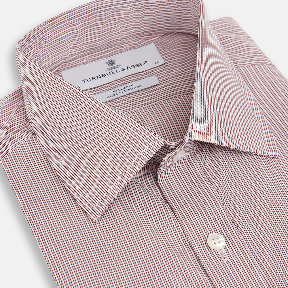 A Red and Pink Ticking Stripe Mayfair Shirt by Turnbull & Asser, featuring a classic T&A collar, buttoned cuffs, and subtle vertical pinstripes, shown on a white background.