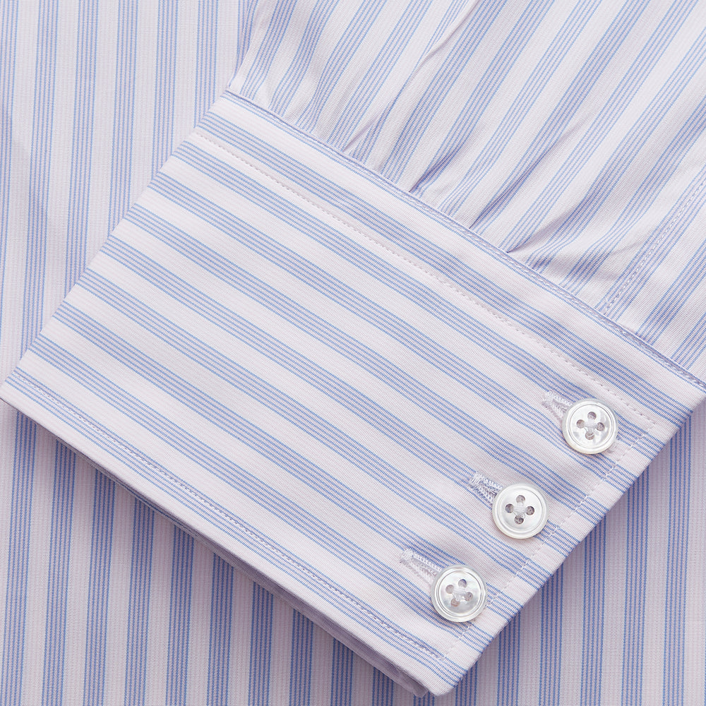 The Turnbull & Asser Lilac Stripe Cotton Regular Fit Mayfair Shirt features thin white and lilac stripes, a T&A collar, and buttoned cuffs, shown laid flat on a white background.