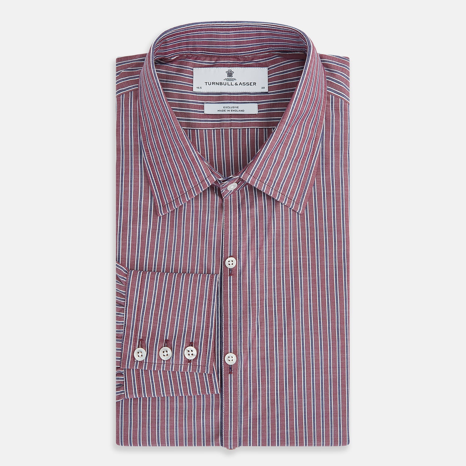 View 5 of product The Turnbull & Asser Wine Ticking Stripe Westminster Shirt features red, blue, and white vertical pinstripes on white and is shown laid flat on a white surface.