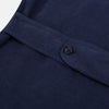 View 4 of product The Turnbull & Asser Light Navy Kingston Corduroy Caban Jacket features a double-breasted stretch cotton corduroy design with black buttons, notched collar, and long buttoned cuffs, displayed on a plain white background.